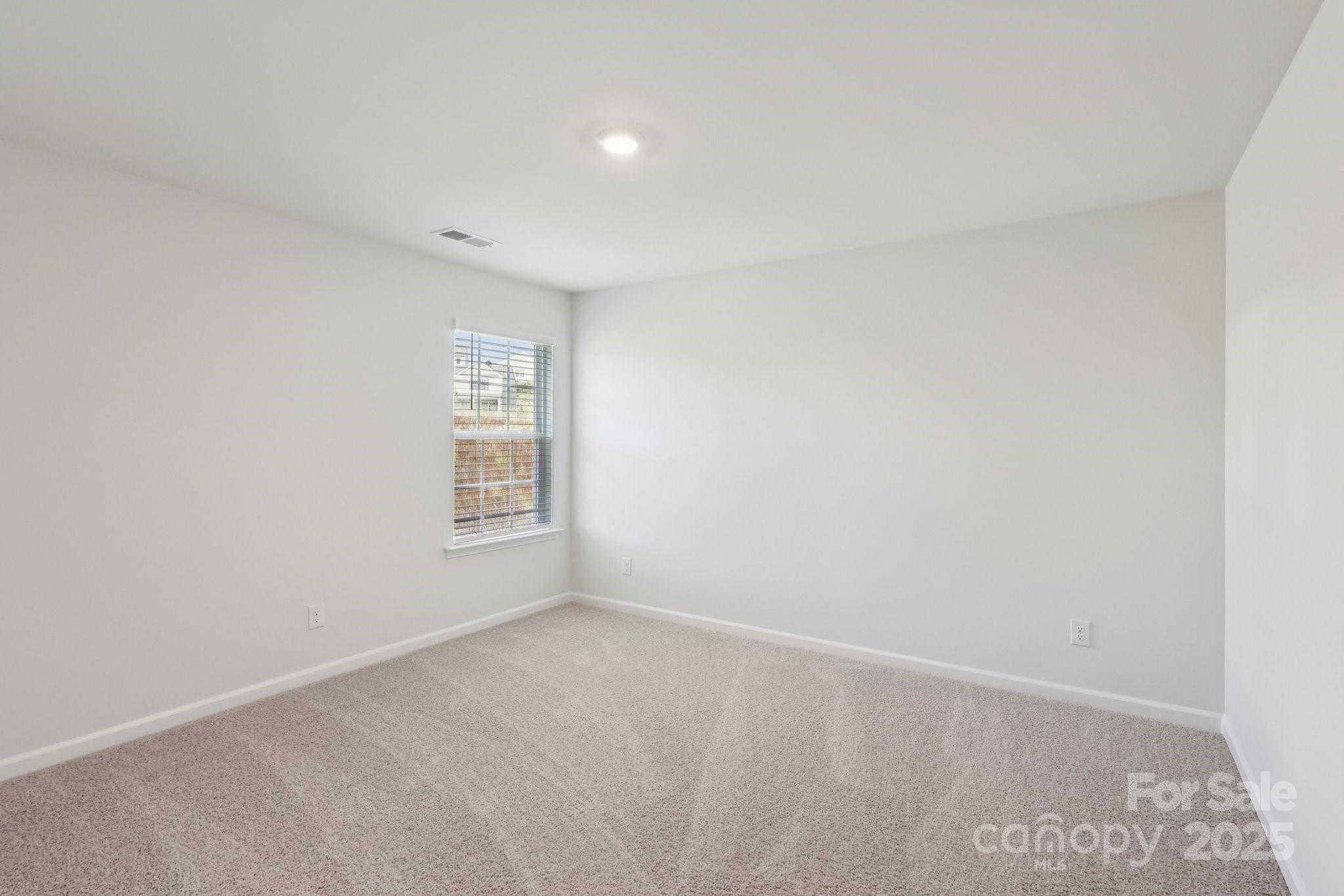 3919 Caroline Court Northwest Conover, NC 28613 - Photo 31 of 35 a view of an empty room with a window