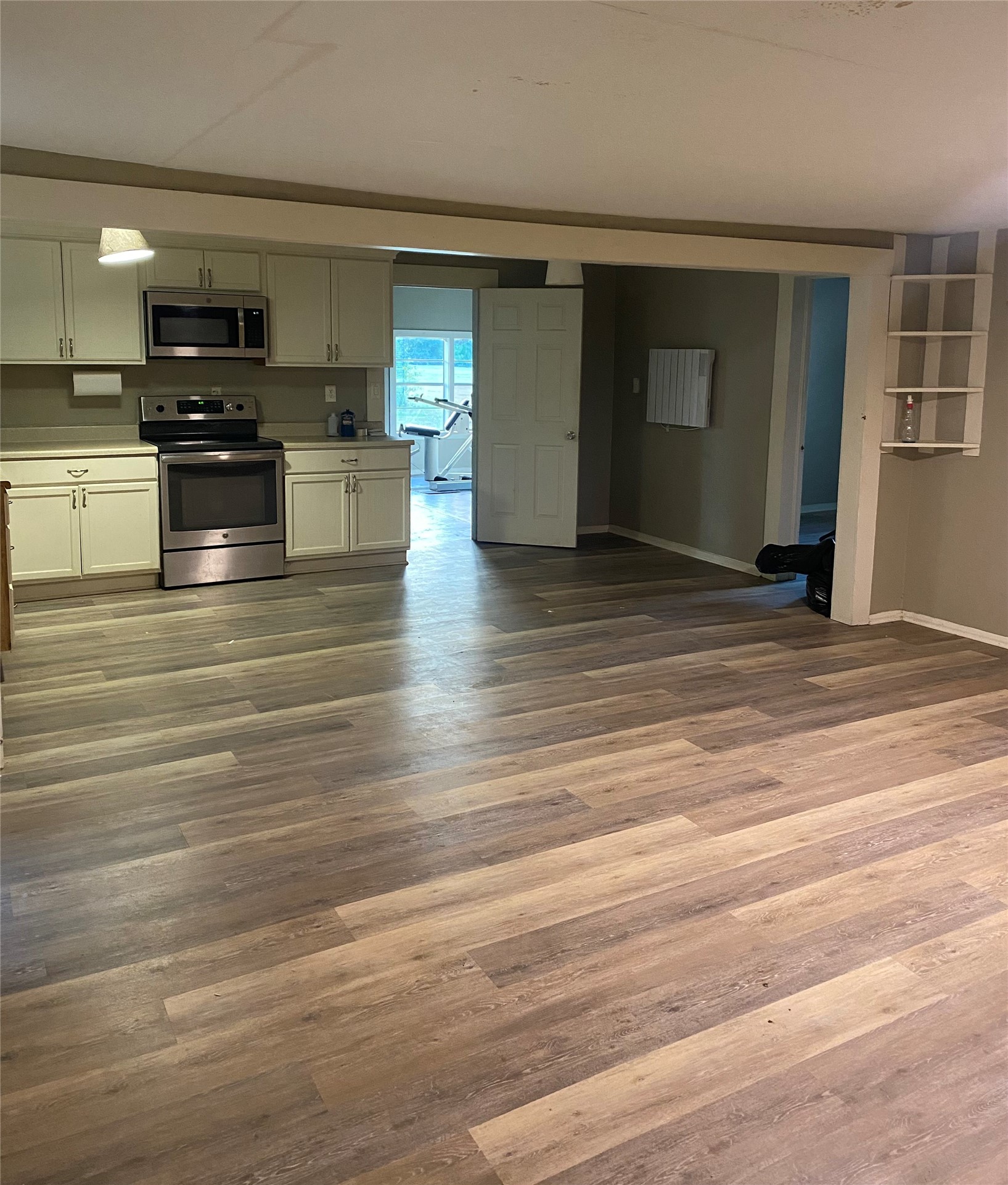 983 County Road, Unit 4350 Woodville, TX 75979 - Photo 2 of 18 a view of kitchen and microwave