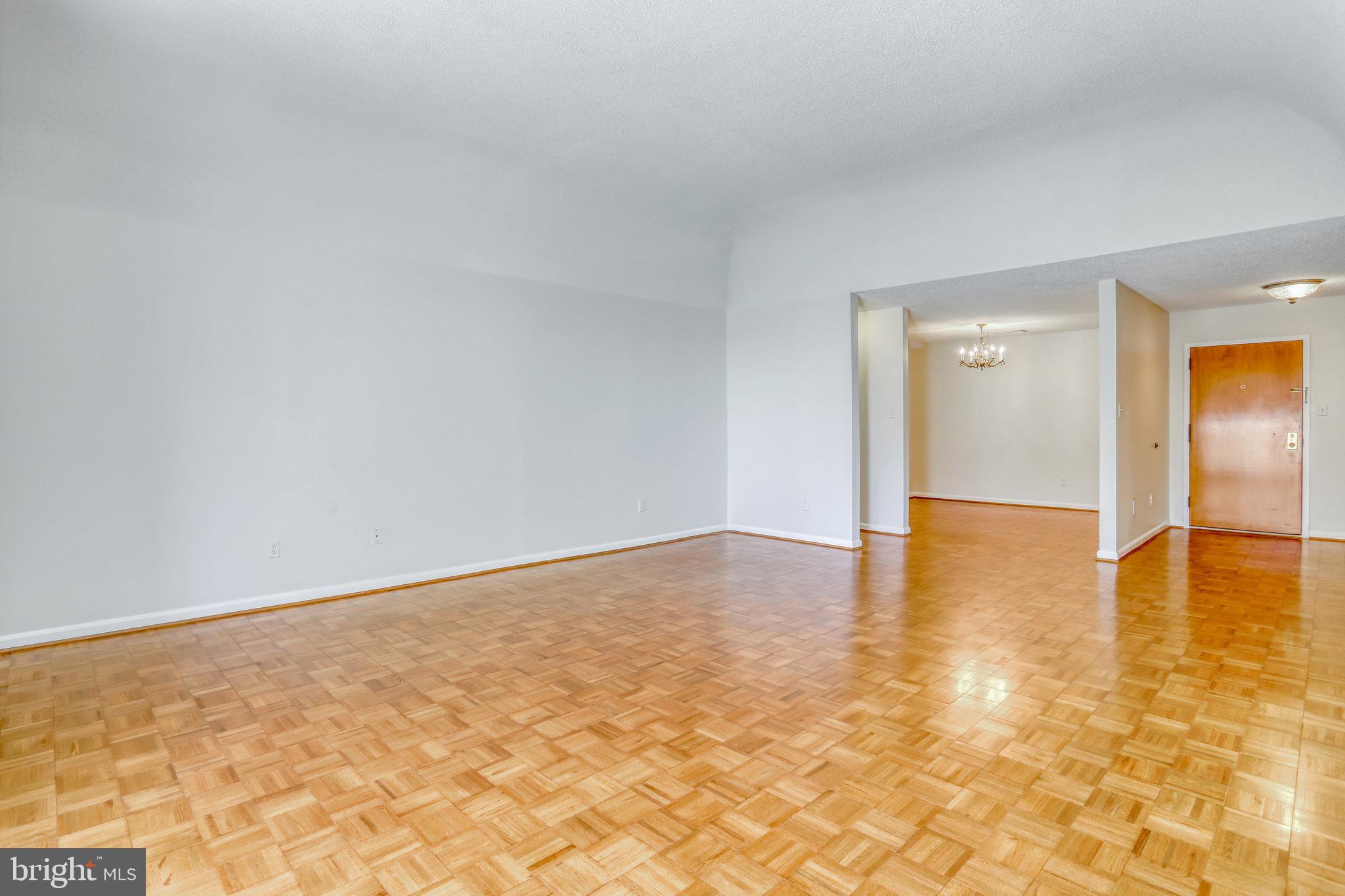 1101 South Arlington Ridge Road, Unit 114 Arlington, VA 22202 - Photo 7 of 44 Living room looking toward dining room
