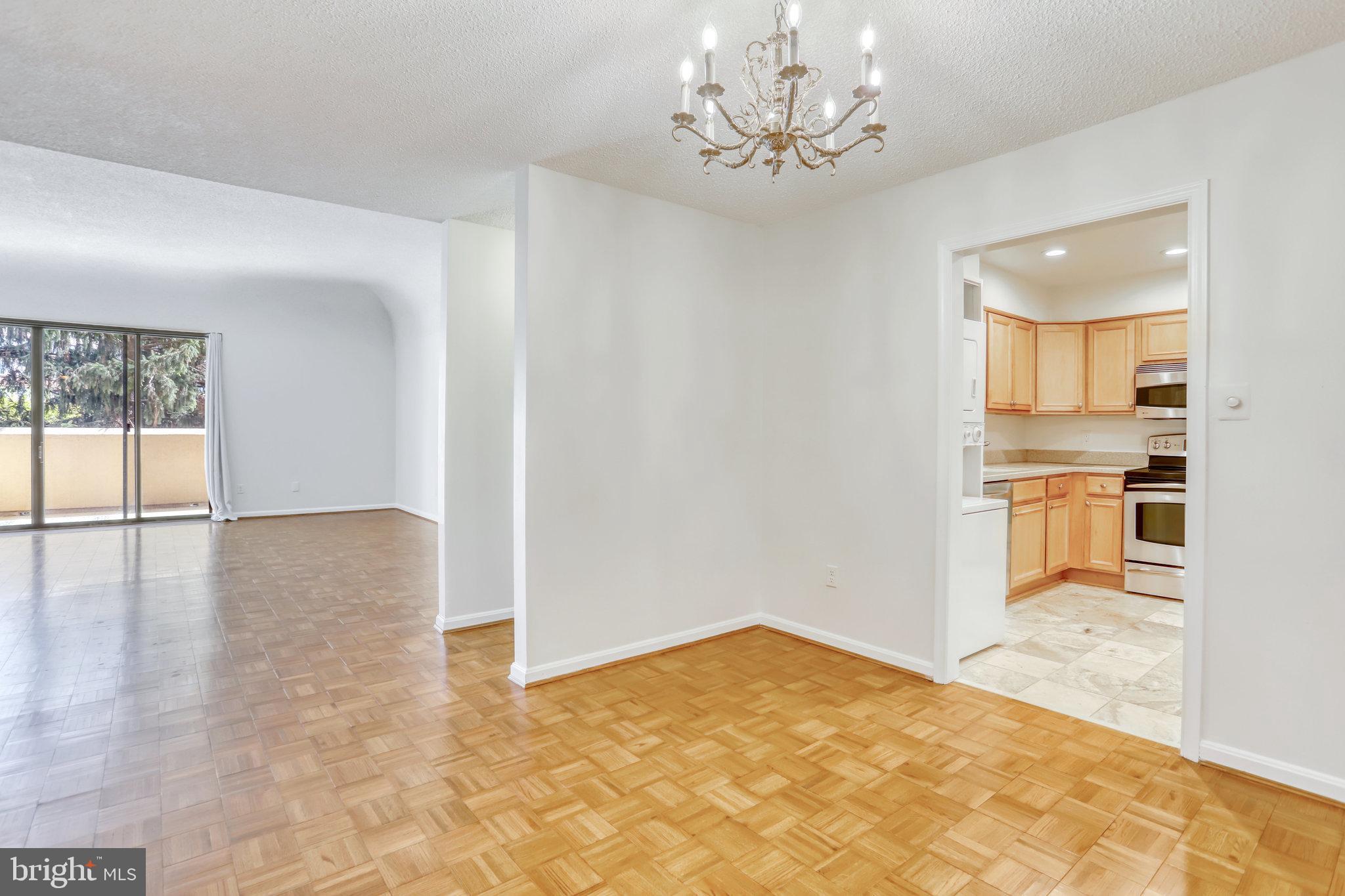 1101 South Arlington Ridge Road, Unit 114 Arlington, VA 22202 - Photo 9 of 44 Kitchen, dining room, living room