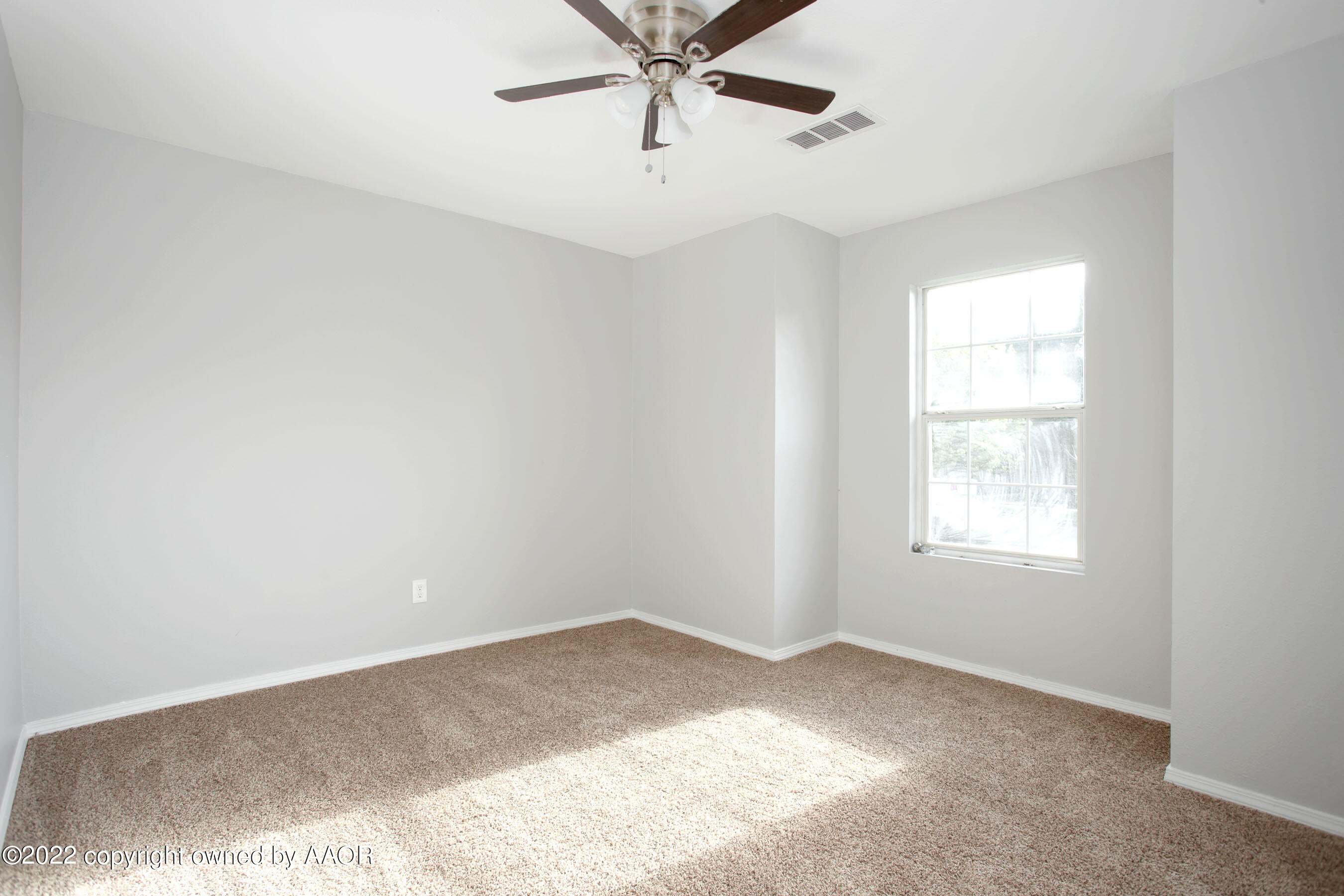 3808 Ross Street Amarillo, TX 79118 - Photo 17 of 22 a view of a window in an empty room