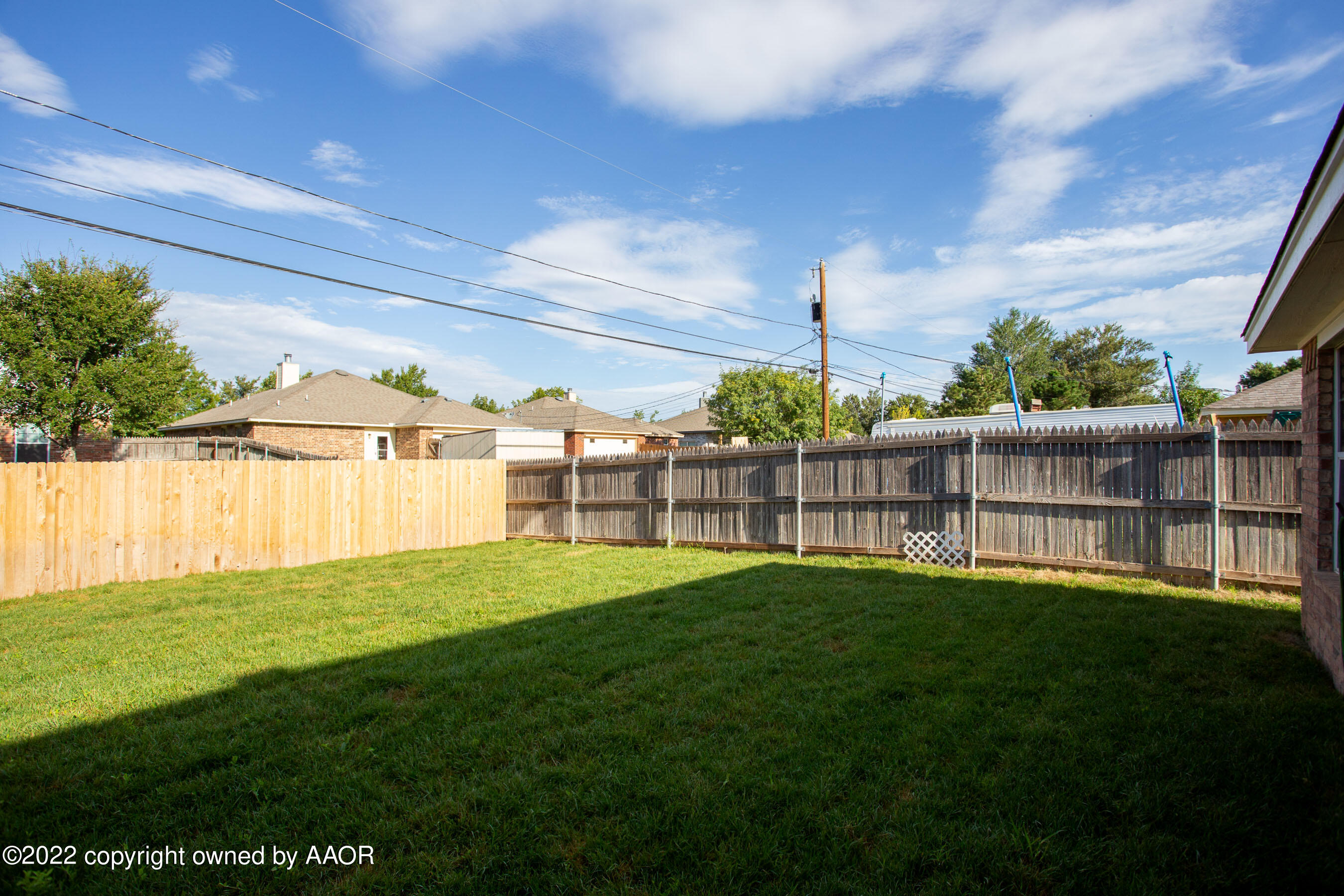3808 Ross Street Amarillo, TX 79118 - Photo 21 of 22 a view of a backyard with a garden