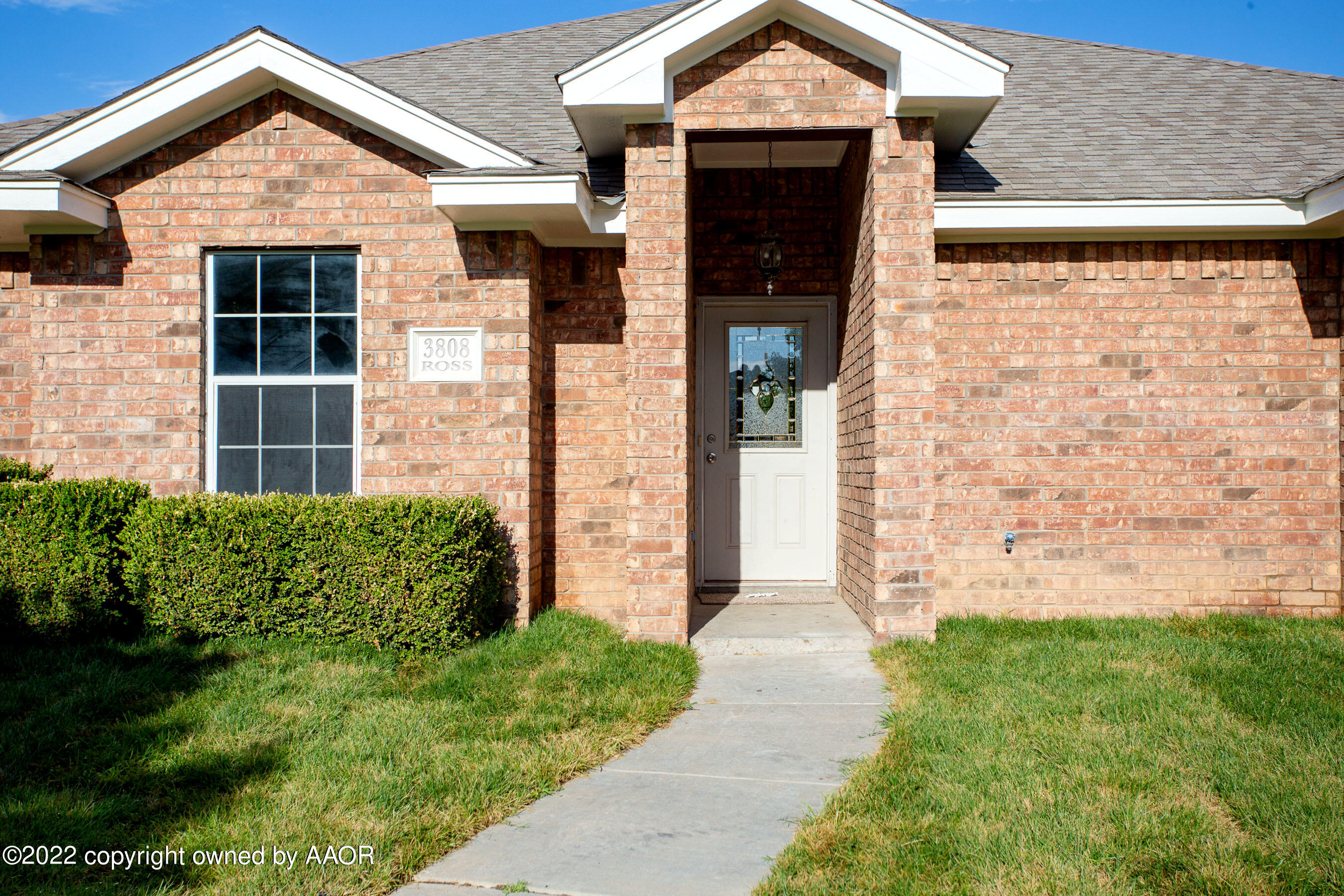 3808 Ross Street Amarillo, TX 79118 - Photo 22 of 22 a front view of a house with garden