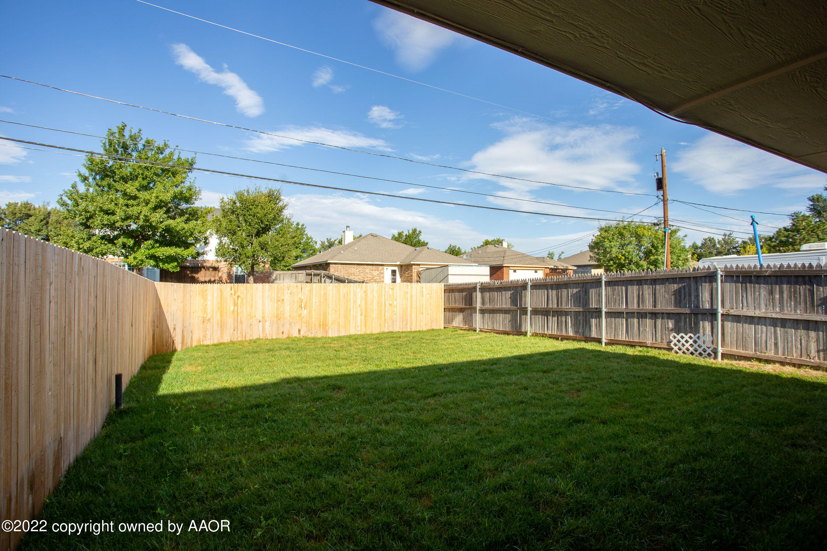 3808 Ross Street Amarillo, TX 79118 - Photo 6 of 22 a view of a backyard with a garden