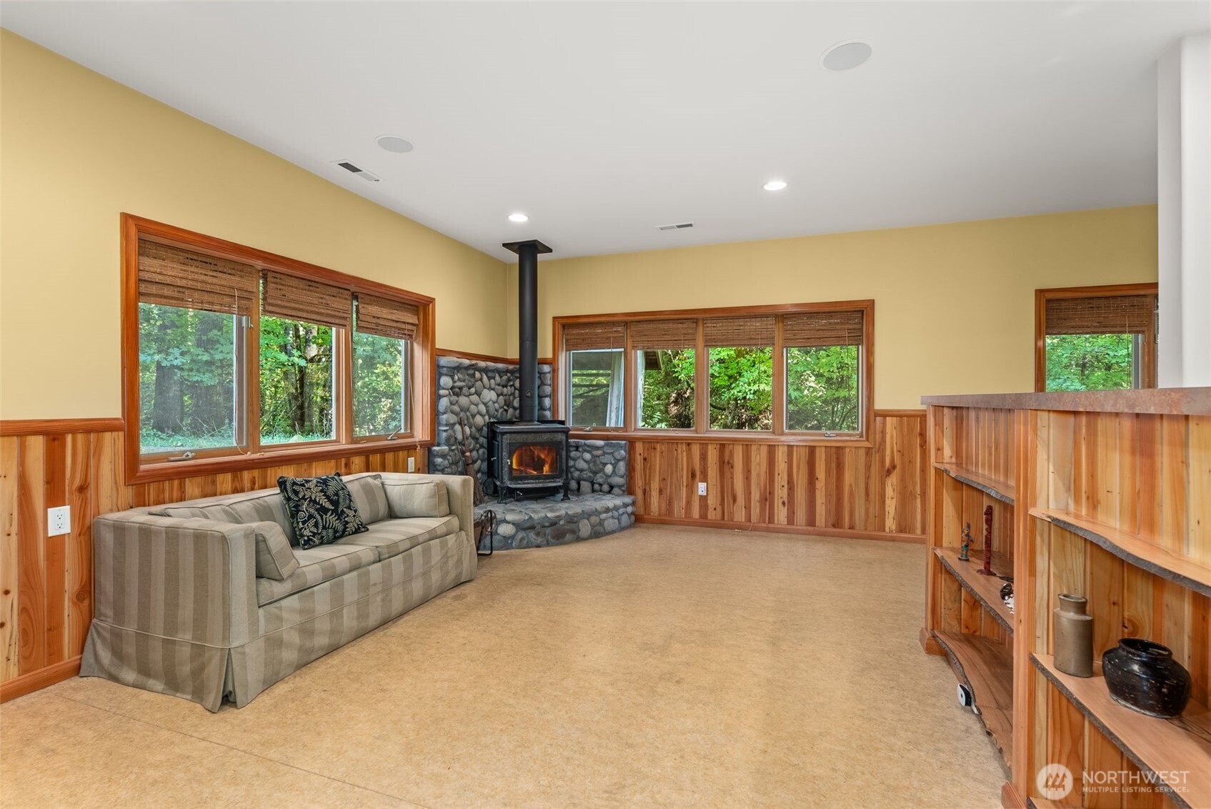 299 Conrad Road Winlock, WA 98596 - Photo 22 of 40 a living room with furniture and a large window
