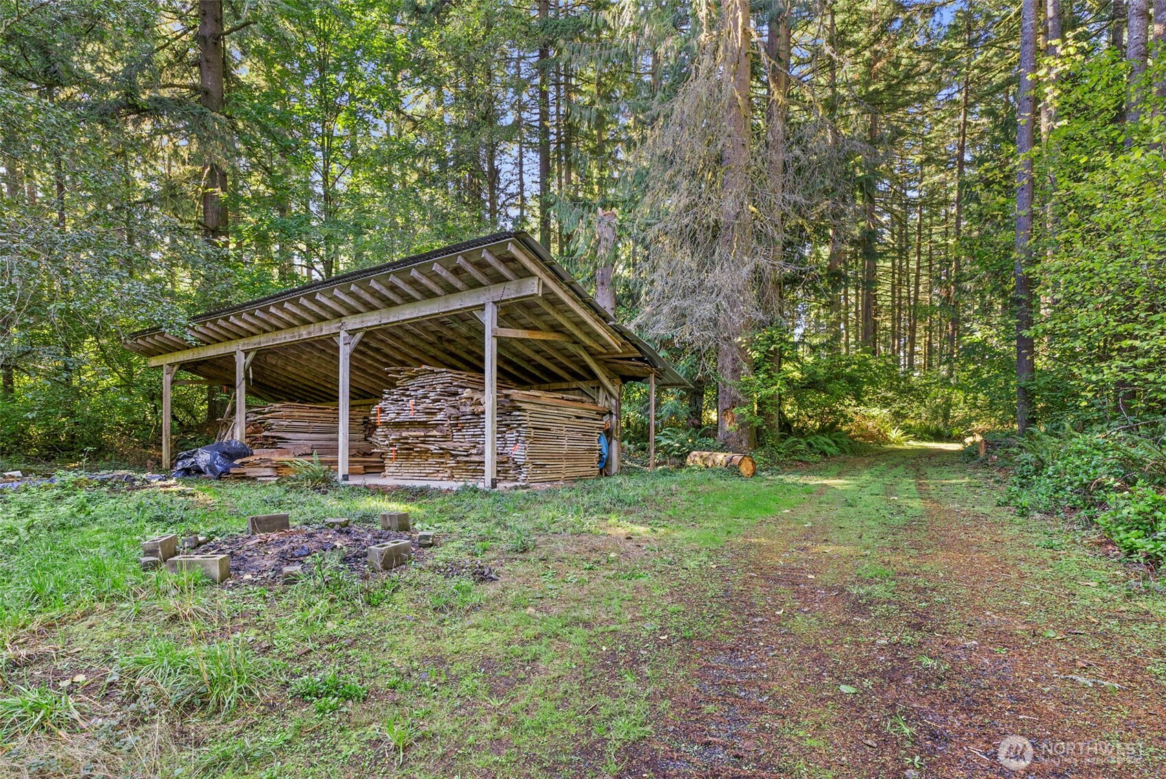 299 Conrad Road Winlock, WA 98596 - Photo 31 of 40 a view of a house with backyard