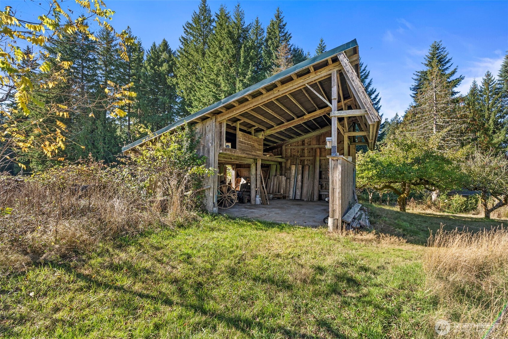 299 Conrad Road Winlock, WA 98596 - Photo 36 of 40 a view of a house with backyard and sitting area