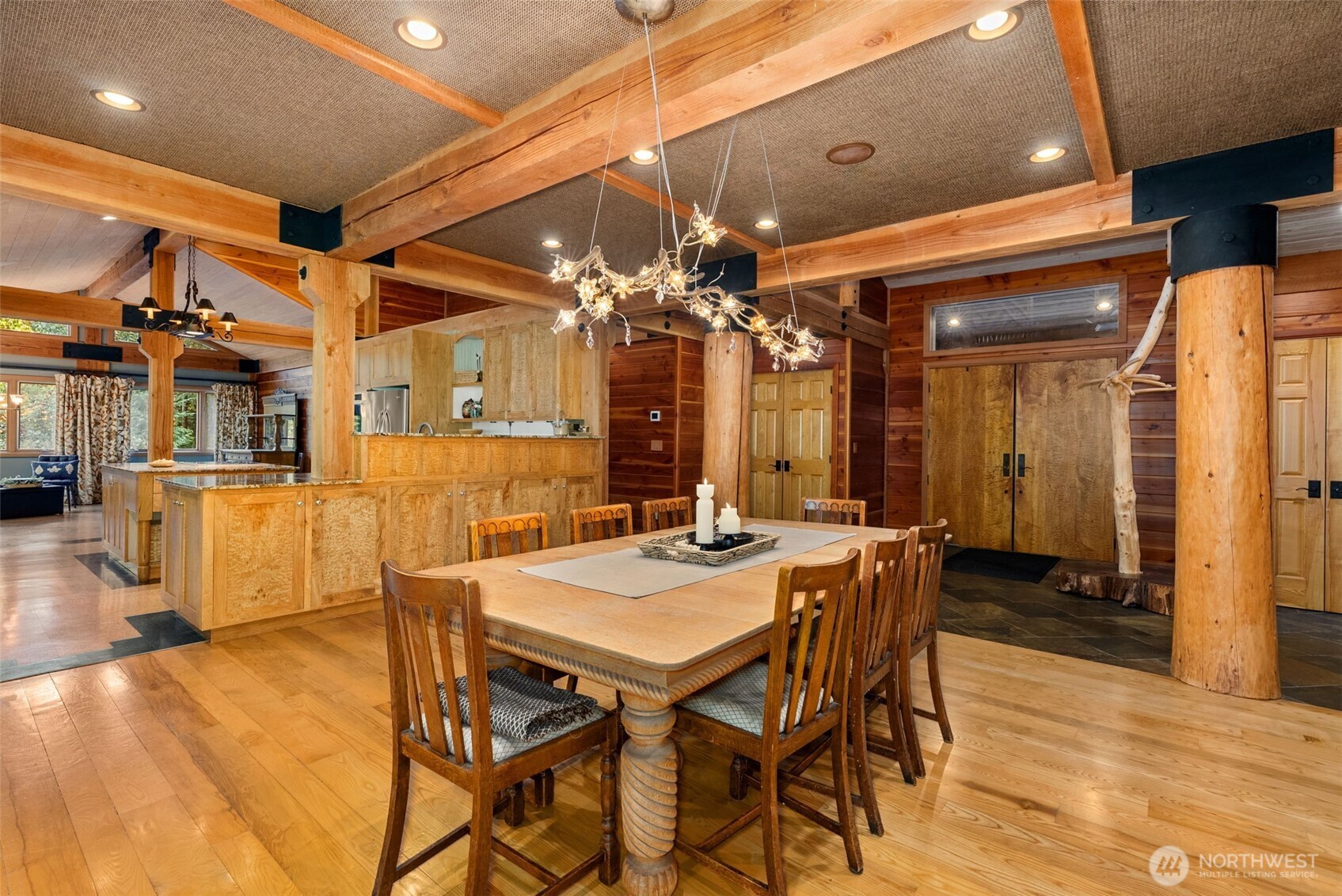 299 Conrad Road Winlock, WA 98596 - Photo 8 of 40 a view of a dining room with furniture and chandelier