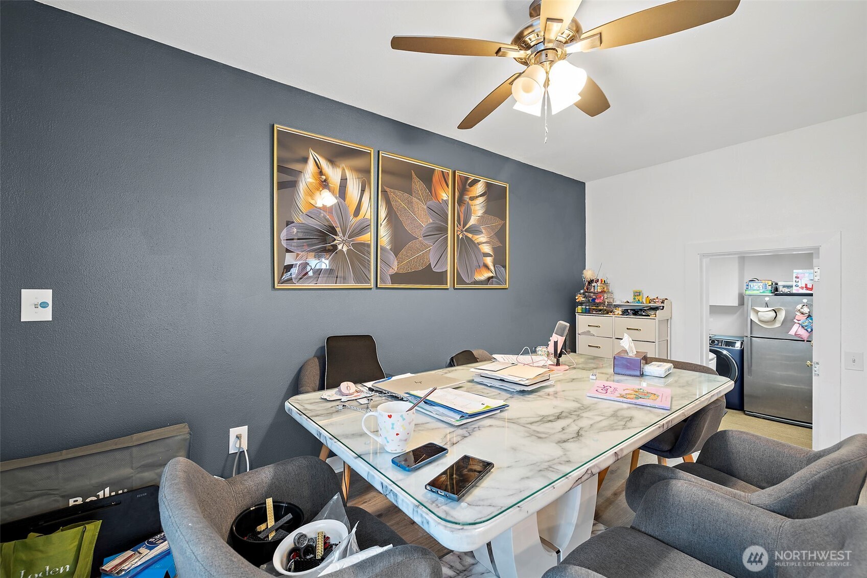 128 Northeast 125th Street Seattle, WA 98125 - Photo 12 of 39 a view of a dining room with furniture and chandelier