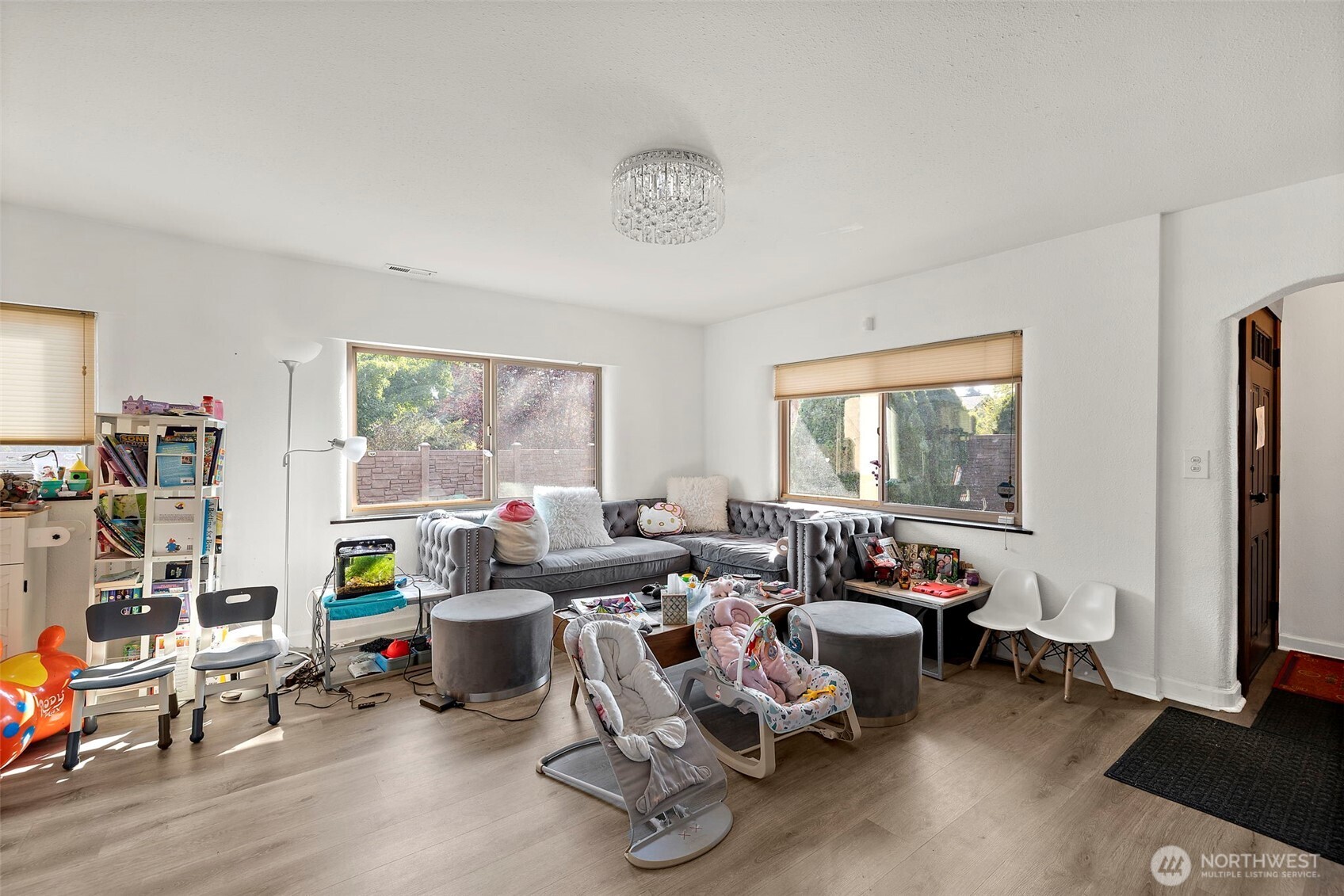 128 Northeast 125th Street Seattle, WA 98125 - Photo 2 of 39 a living room with furniture and a window