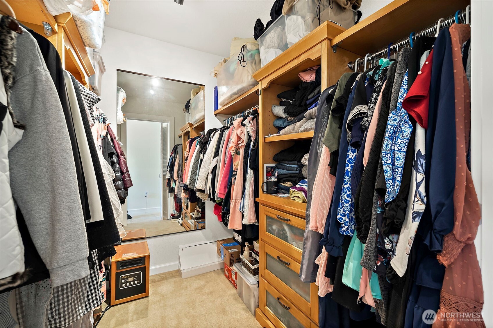 128 Northeast 125th Street Seattle, WA 98125 - Photo 23 of 39 a view of walk in closet with clothes