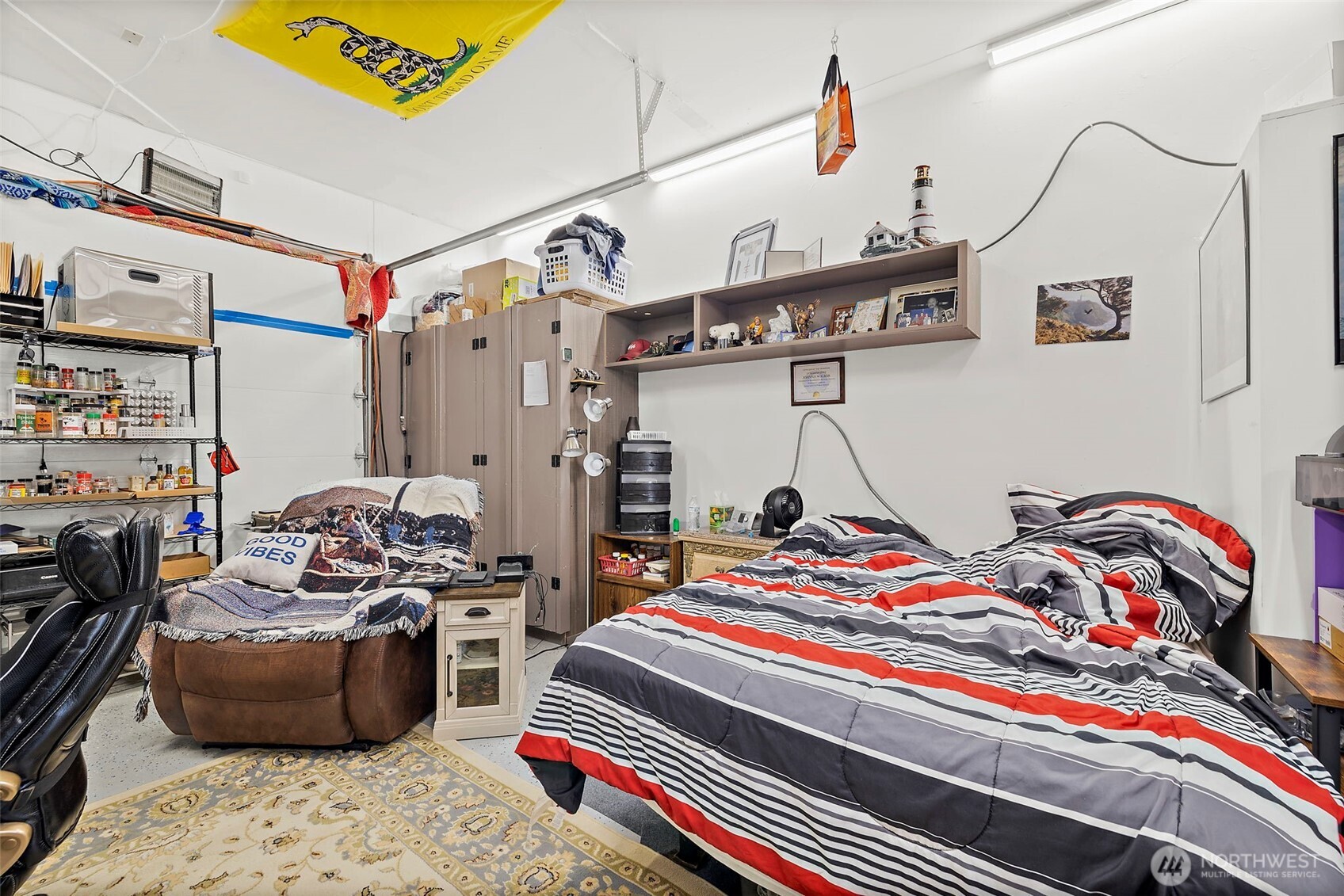 128 Northeast 125th Street Seattle, WA 98125 - Photo 28 of 39 a bed room with a bed and a couch