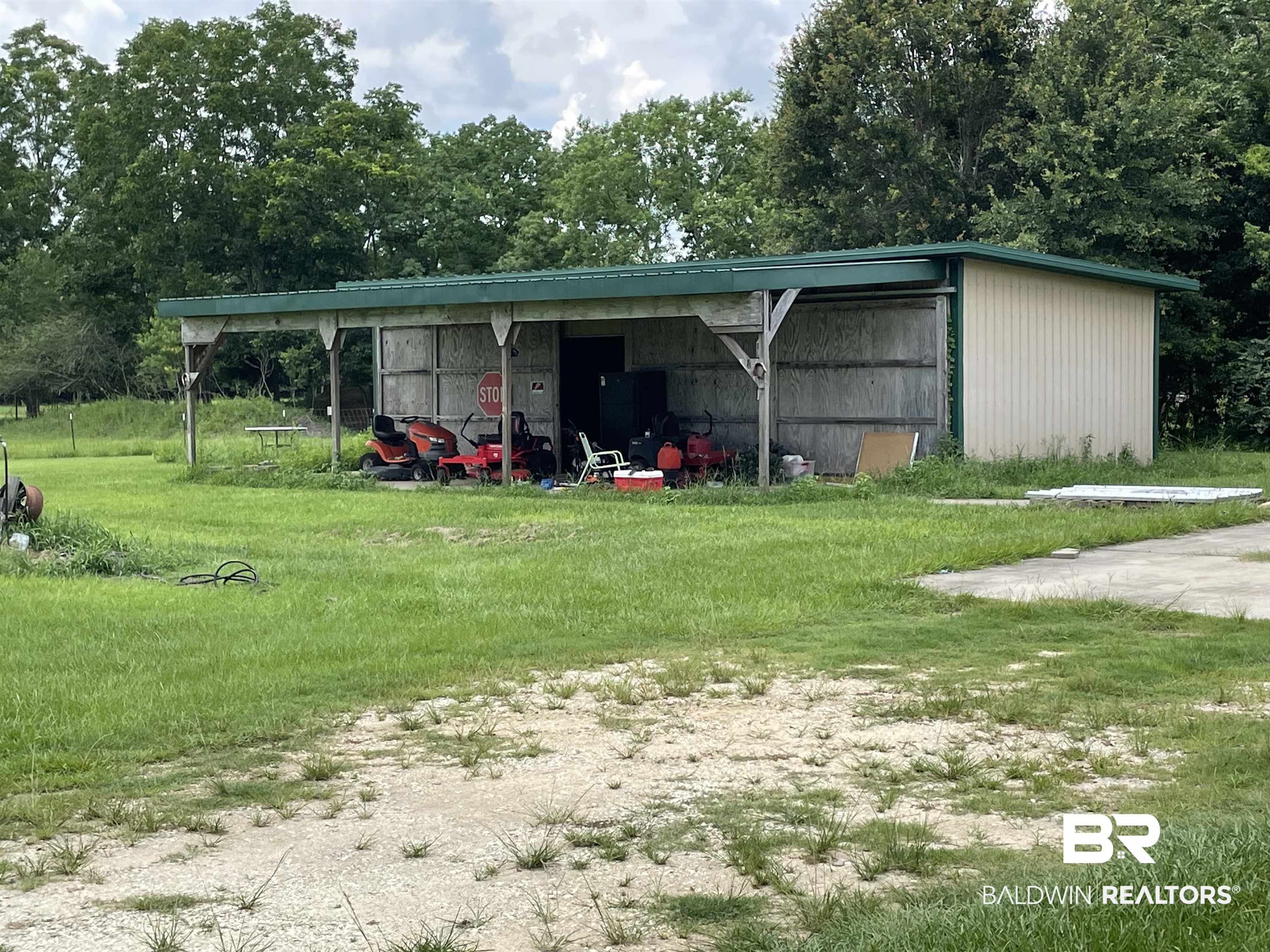 12753 Breman Road Elberta, AL 36530 - Photo 6 of 14 Exterior space with a carport and a yard