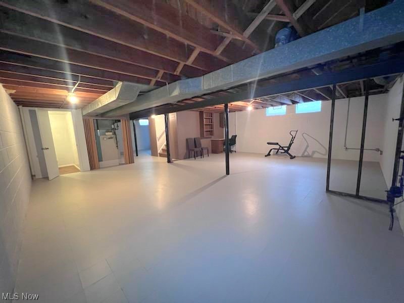 11701 Fordham Road Garfield Heights, OH 44125 - Photo 13 of 19 spacious basement area can be made as additional living/entertaining space.