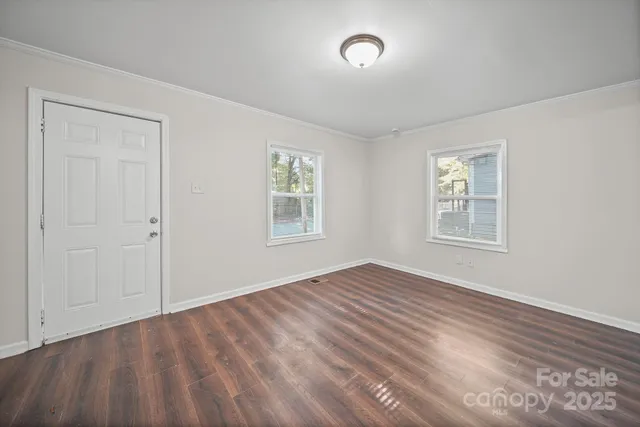 an empty room with windows