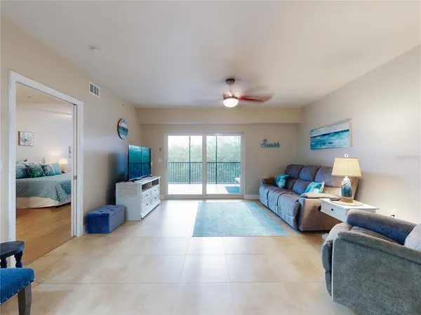 a kitchen with stainless steel appliances granite countertop a stove and a refrigerator