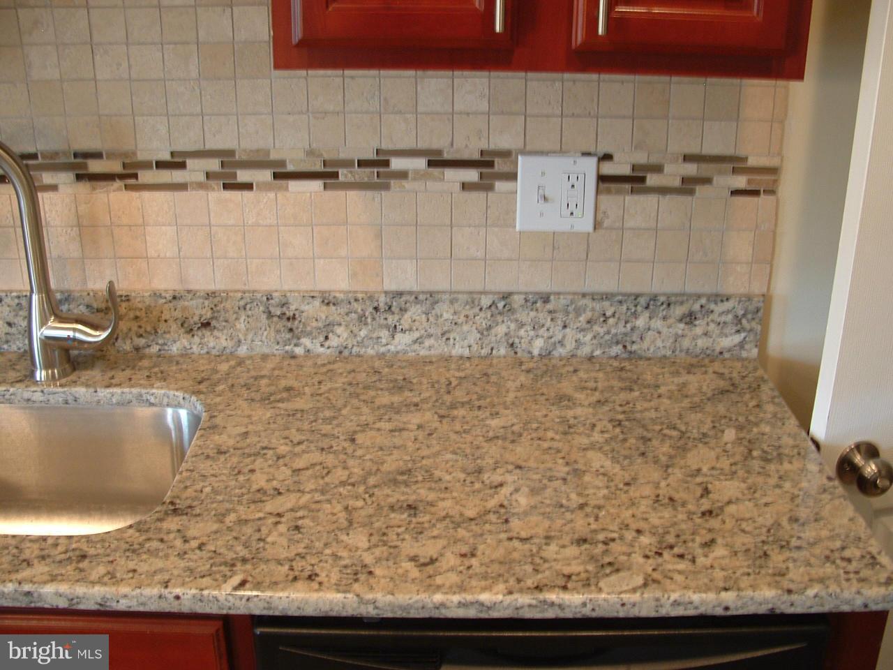 338 Torner Road Baltimore, MD 21221 - Photo 13 of 30 a bathroom with a granite countertop sink