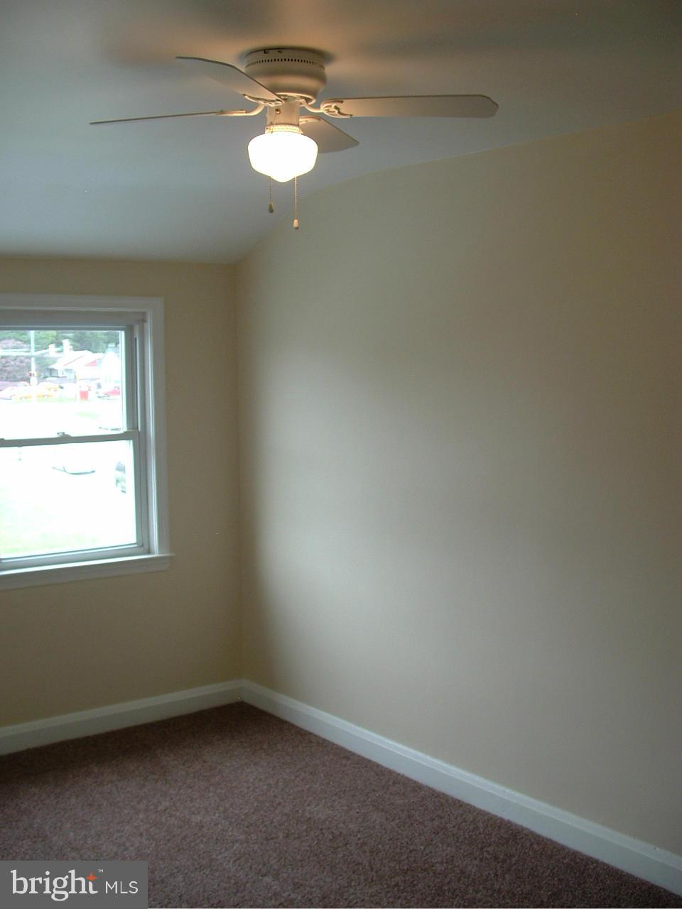 338 Torner Road Baltimore, MD 21221 - Photo 27 of 30 an empty room with a window