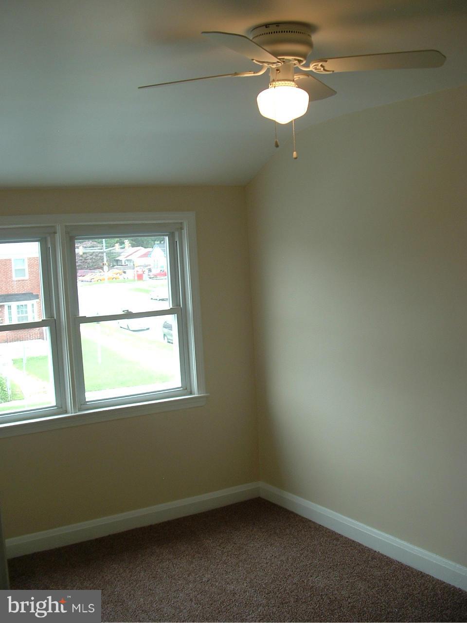 338 Torner Road Baltimore, MD 21221 - Photo 28 of 30 an empty room with a window