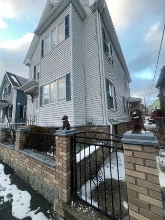 a front view of a house with yard