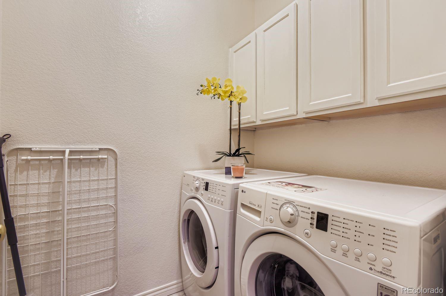 Undisclosed Address Aurora, CO 80013 - Photo 10 of 20 a utility room with dryer and washer