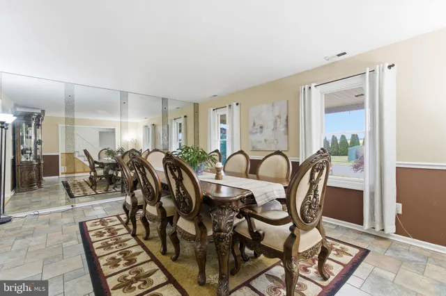 a view of a a dining room with furniture