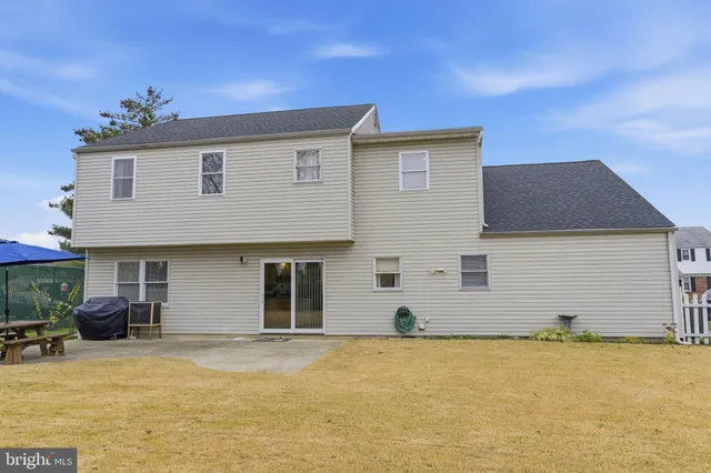 a front view of house with yard