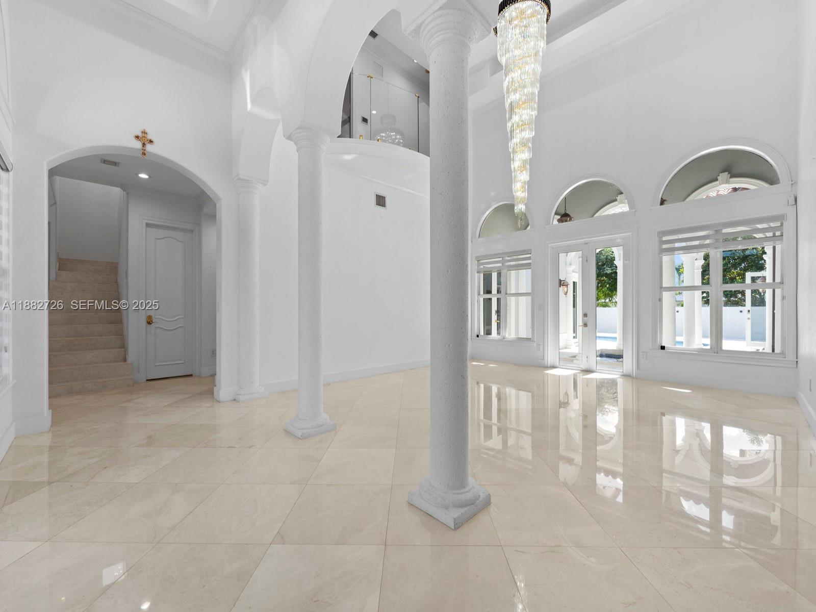 12770 Southwest 188th Street Miami, FL 33177 - Photo 11 of 65 a view of an entryway with wooden floor