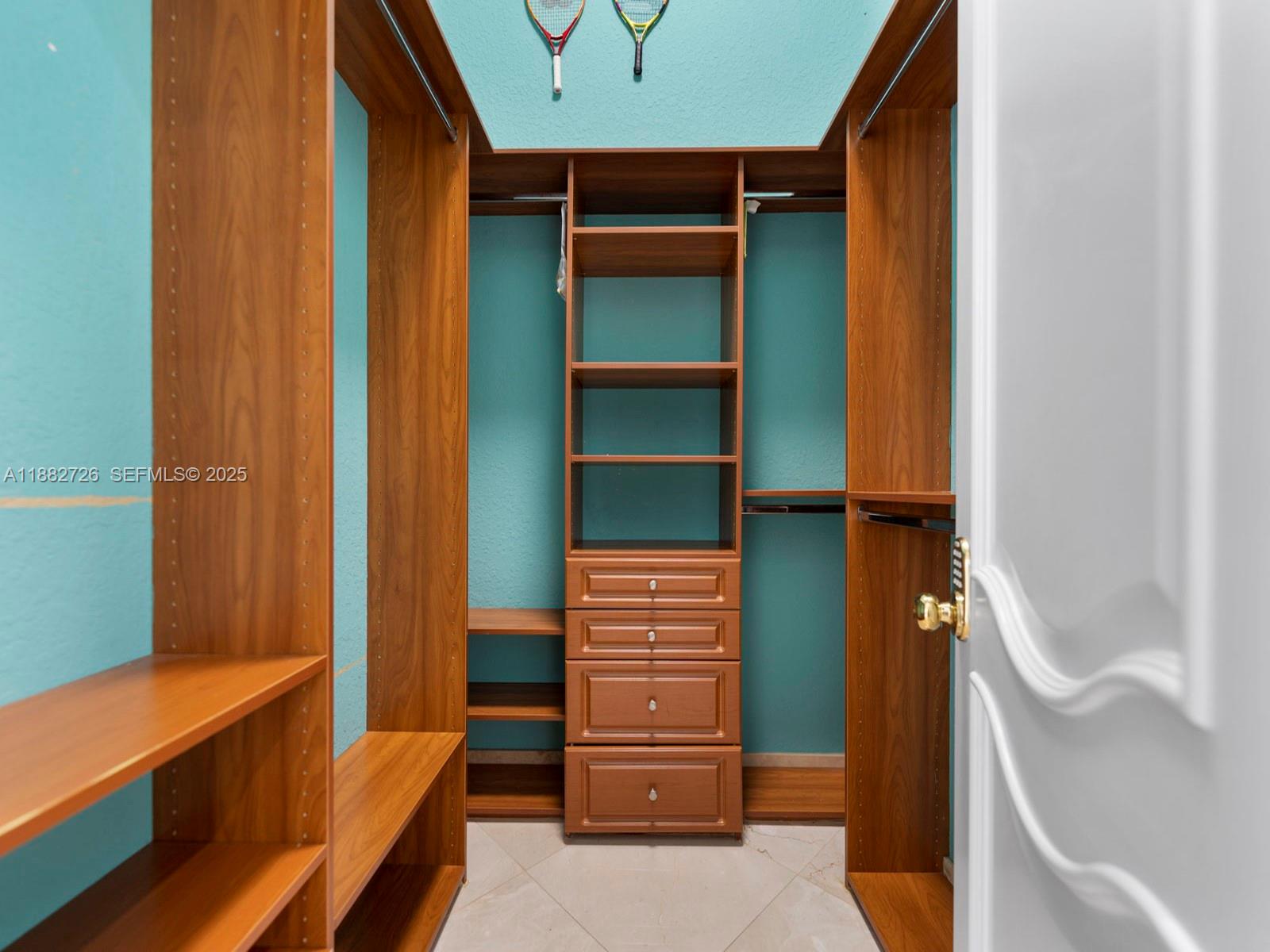 12770 Southwest 188th Street Miami, FL 33177 - Photo 30 of 65 a view of walk in closet