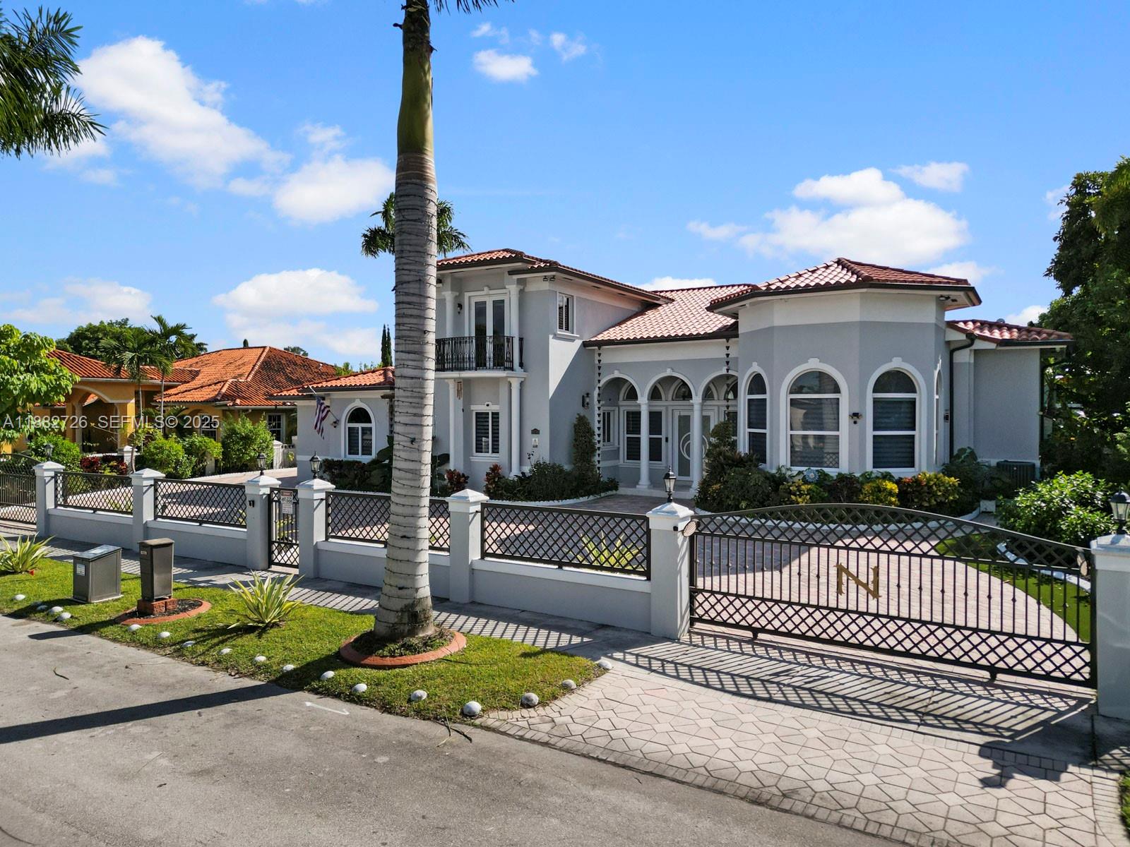 12770 Southwest 188th Street Miami, FL 33177 - Photo 4 of 65 a view of a house with a patio