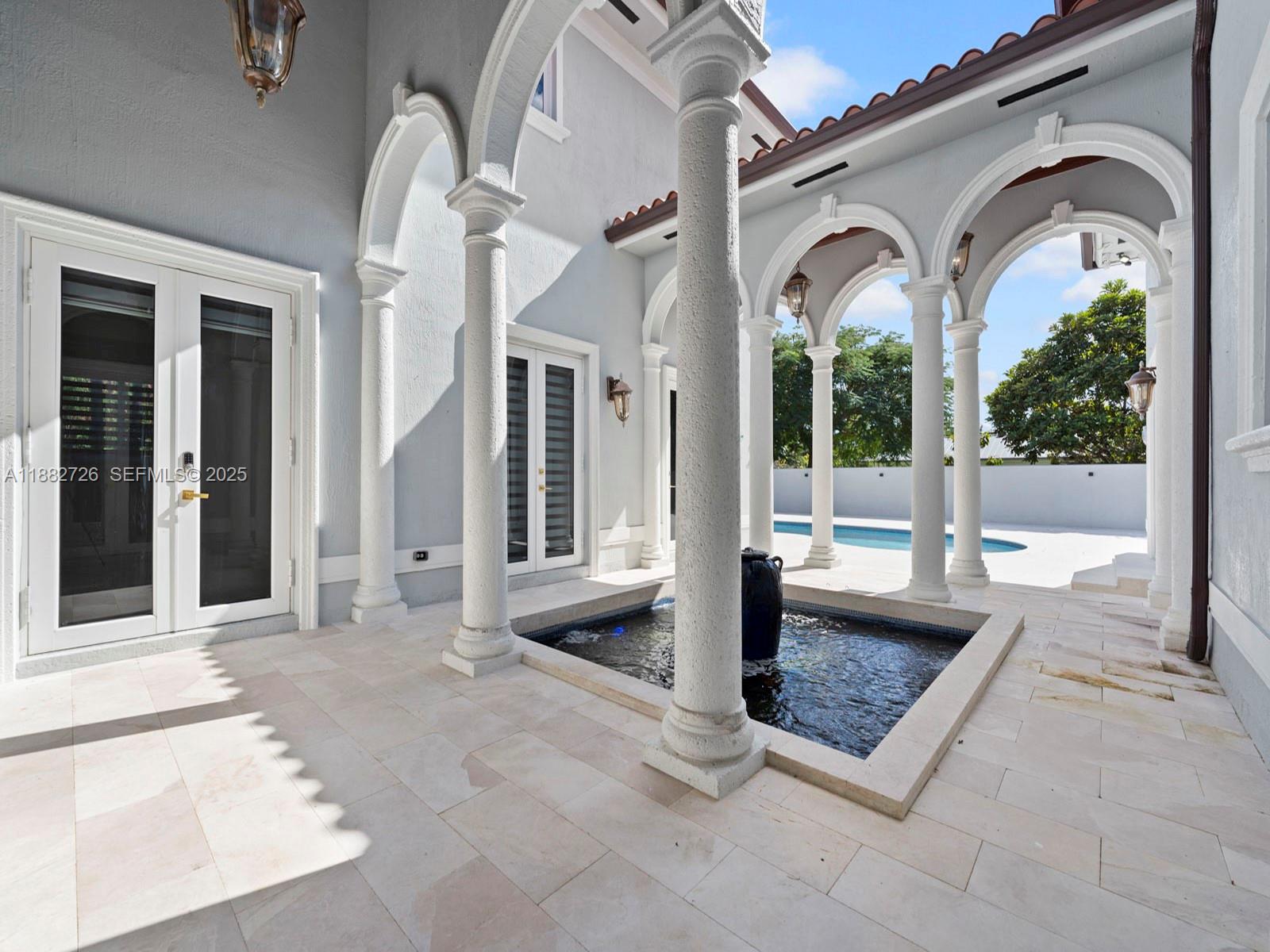 12770 Southwest 188th Street Miami, FL 33177 - Photo 45 of 65 a view of a entryway door front of house