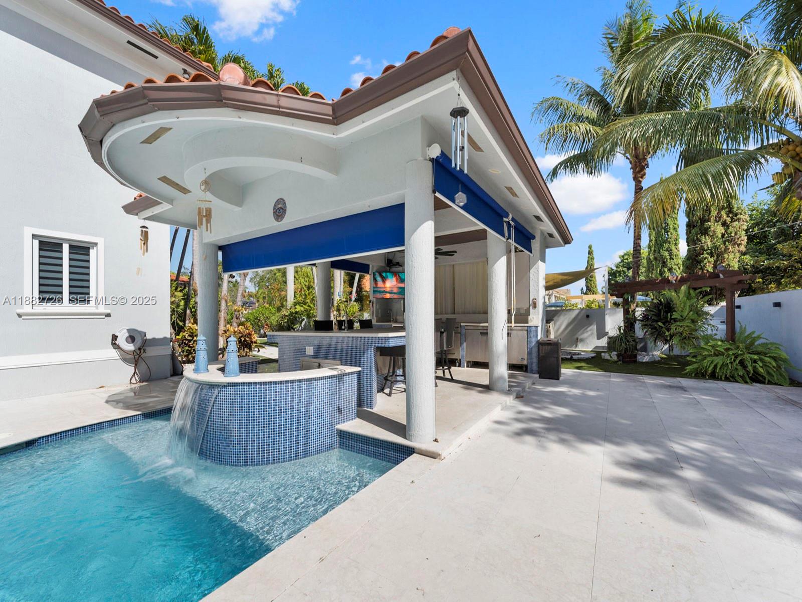 12770 Southwest 188th Street Miami, FL 33177 - Photo 53 of 65 a view of a house with backyard and swimming pool