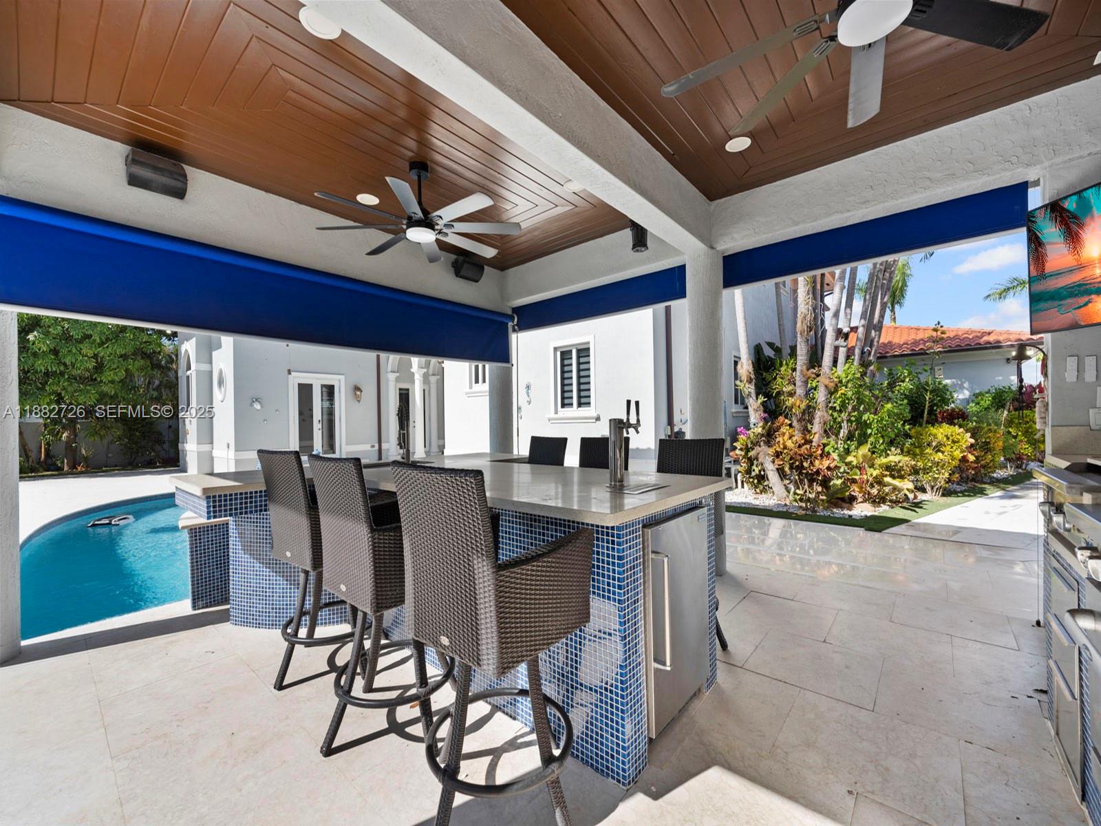 12770 Southwest 188th Street Miami, FL 33177 - Photo 54 of 65 a view of a dining room with furniture window and outside view