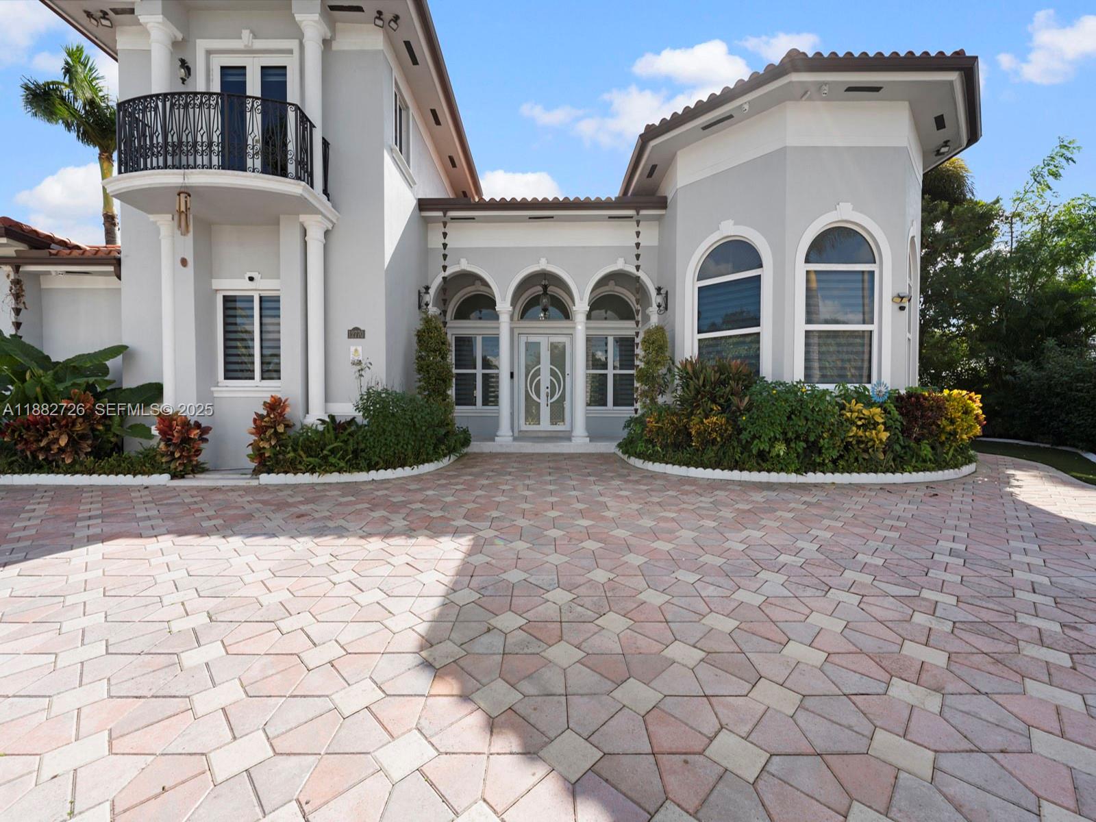 12770 Southwest 188th Street Miami, FL 33177 - Photo 64 of 65 a front view of a house