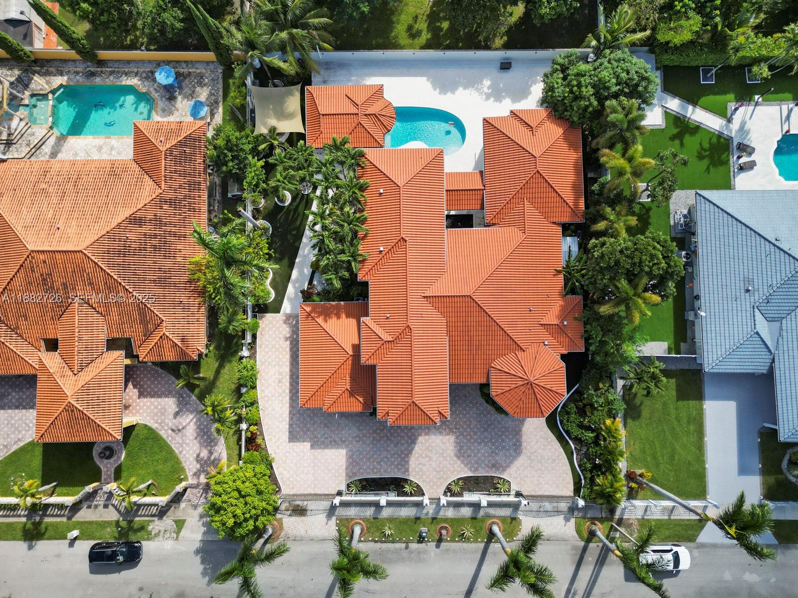 12770 Southwest 188th Street Miami, FL 33177 - Photo 7 of 65 an aerial view of house with yard swimming pool and outdoor seating