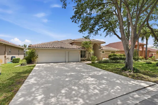 $935,000 | 9851 Northwest 49th Place, Coral Springs, FL 33076