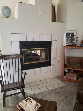 a view of fireplace and microwave