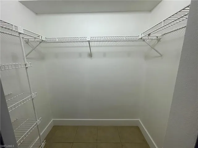 a bathroom with a toilet a sink and a shower