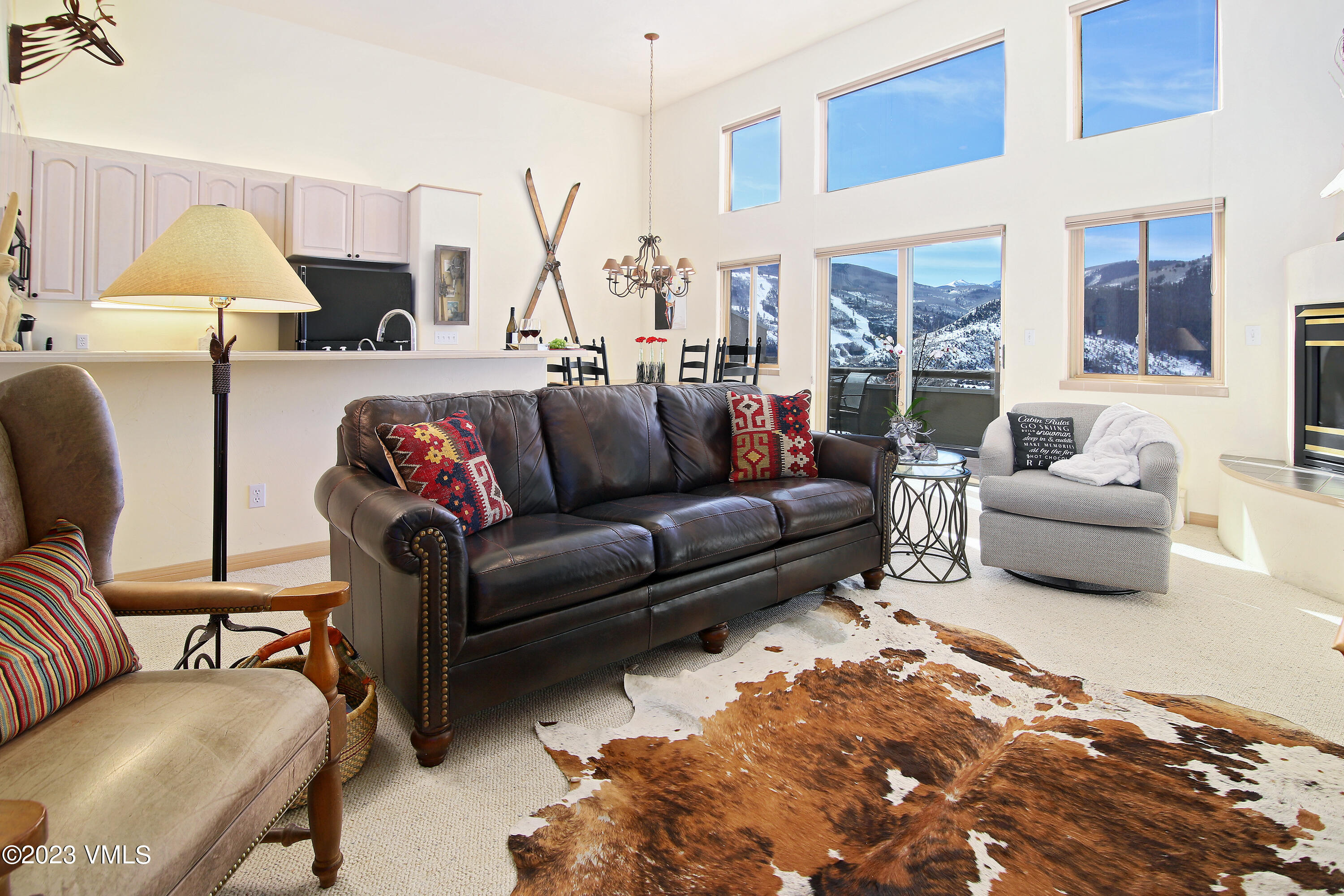 751 Singletree Road, Unit 6 Edwards, CO 81632 - Photo 3 of 30 a living room with furniture and a lamp