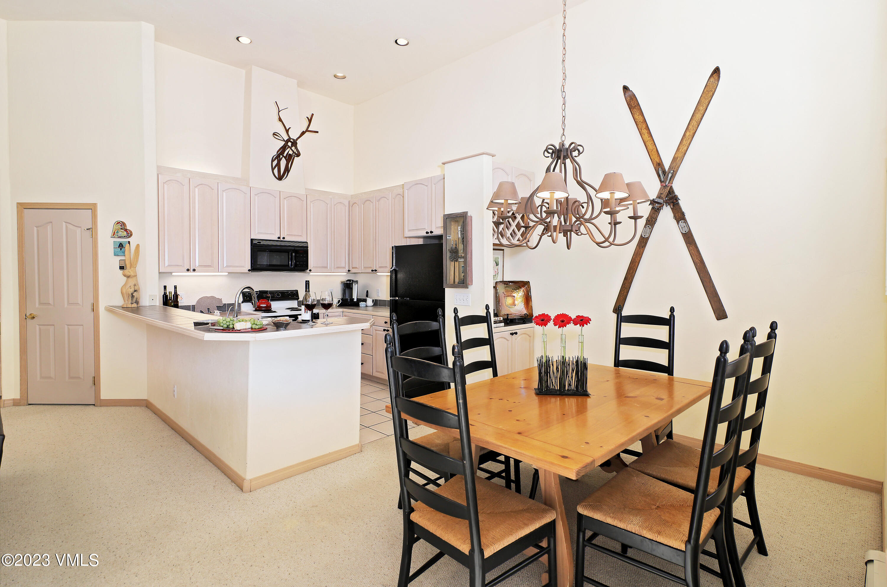 751 Singletree Road, Unit 6 Edwards, CO 81632 - Photo 10 of 30 a view of kitchen with cabinets and wooden floor