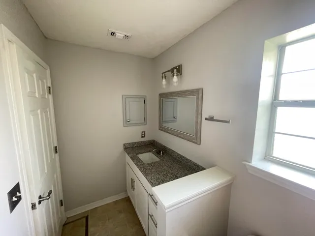 a utility room with washer and dryer
