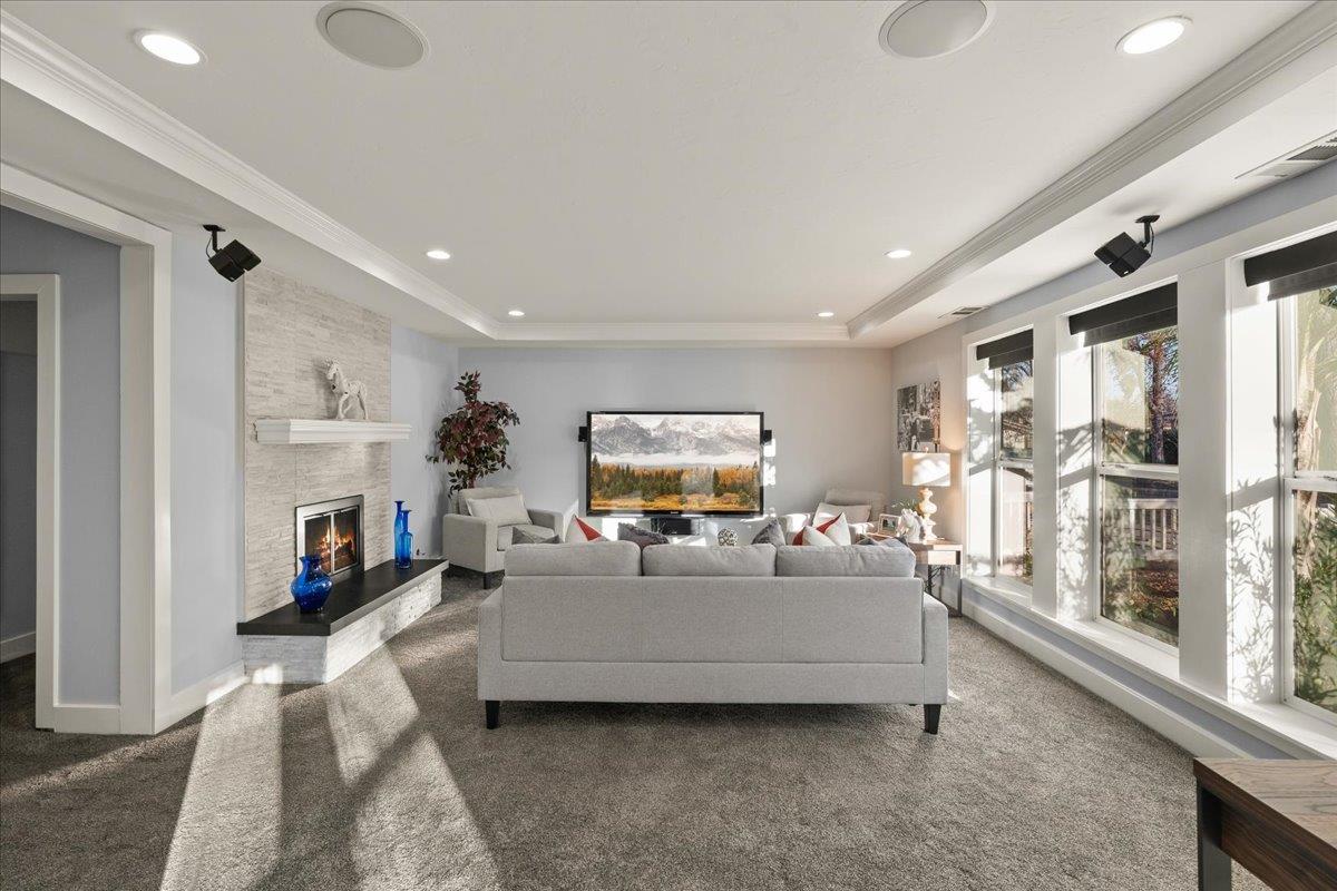 159 Anne Way Los Gatos, CA 95032 - Photo 13 of 50 a living room with furniture a fireplace and a flat screen tv