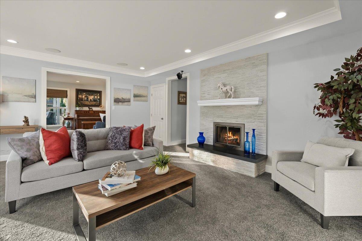 159 Anne Way Los Gatos, CA 95032 - Photo 16 of 50 a living room with furniture and a fireplace