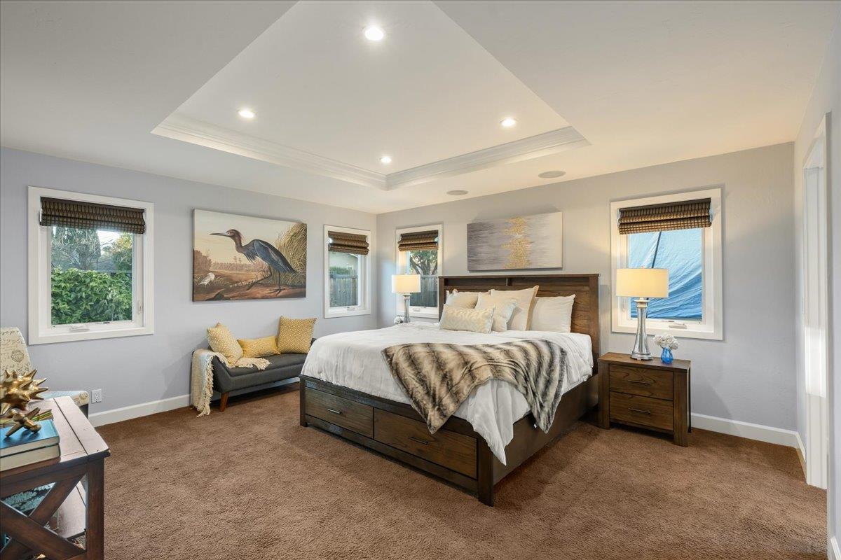 159 Anne Way Los Gatos, CA 95032 - Photo 28 of 50 a spacious bedroom with a bed and a couch
