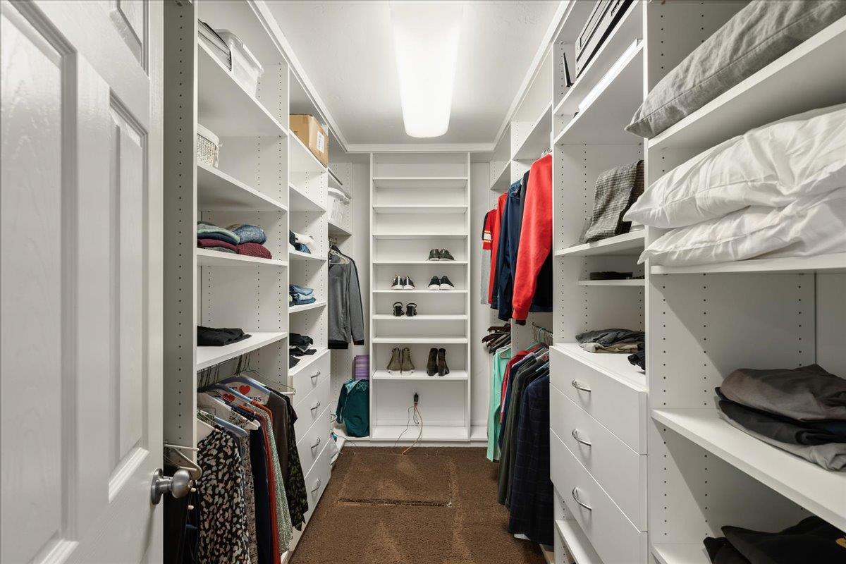 159 Anne Way Los Gatos, CA 95032 - Photo 34 of 50 a view of walk in closet with clothes and shoes