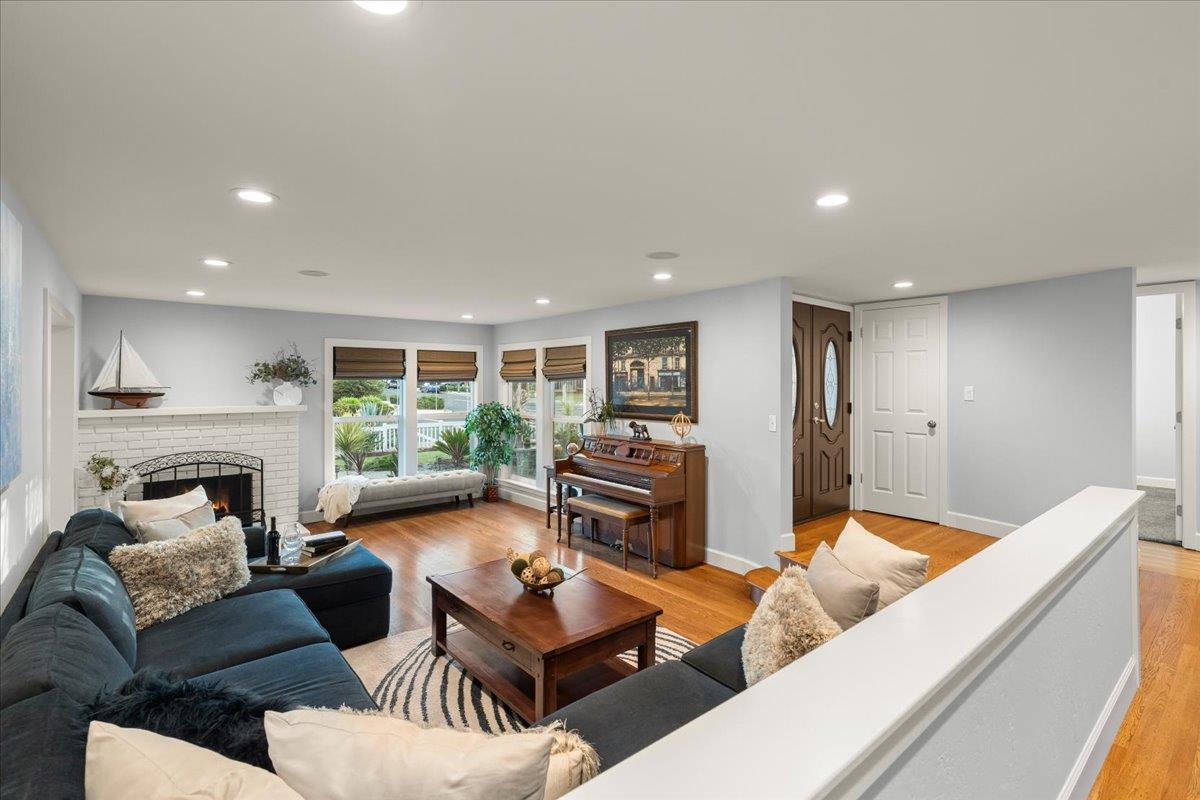 159 Anne Way Los Gatos, CA 95032 - Photo 40 of 50 a living room with furniture fireplace and a table