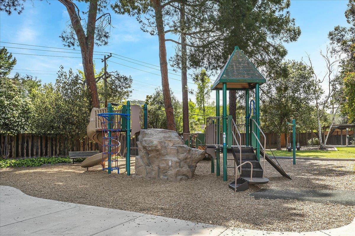 159 Anne Way Los Gatos, CA 95032 - Photo 49 of 50 a backyard of a house with barbeque oven table and chairs