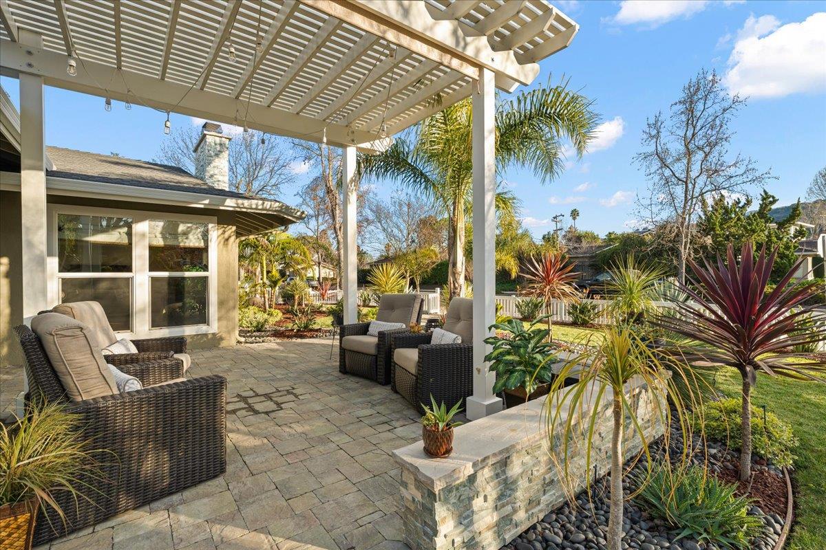 159 Anne Way Los Gatos, CA 95032 - Photo 8 of 50 a view of a patio with couches and table and chairs and potted plants