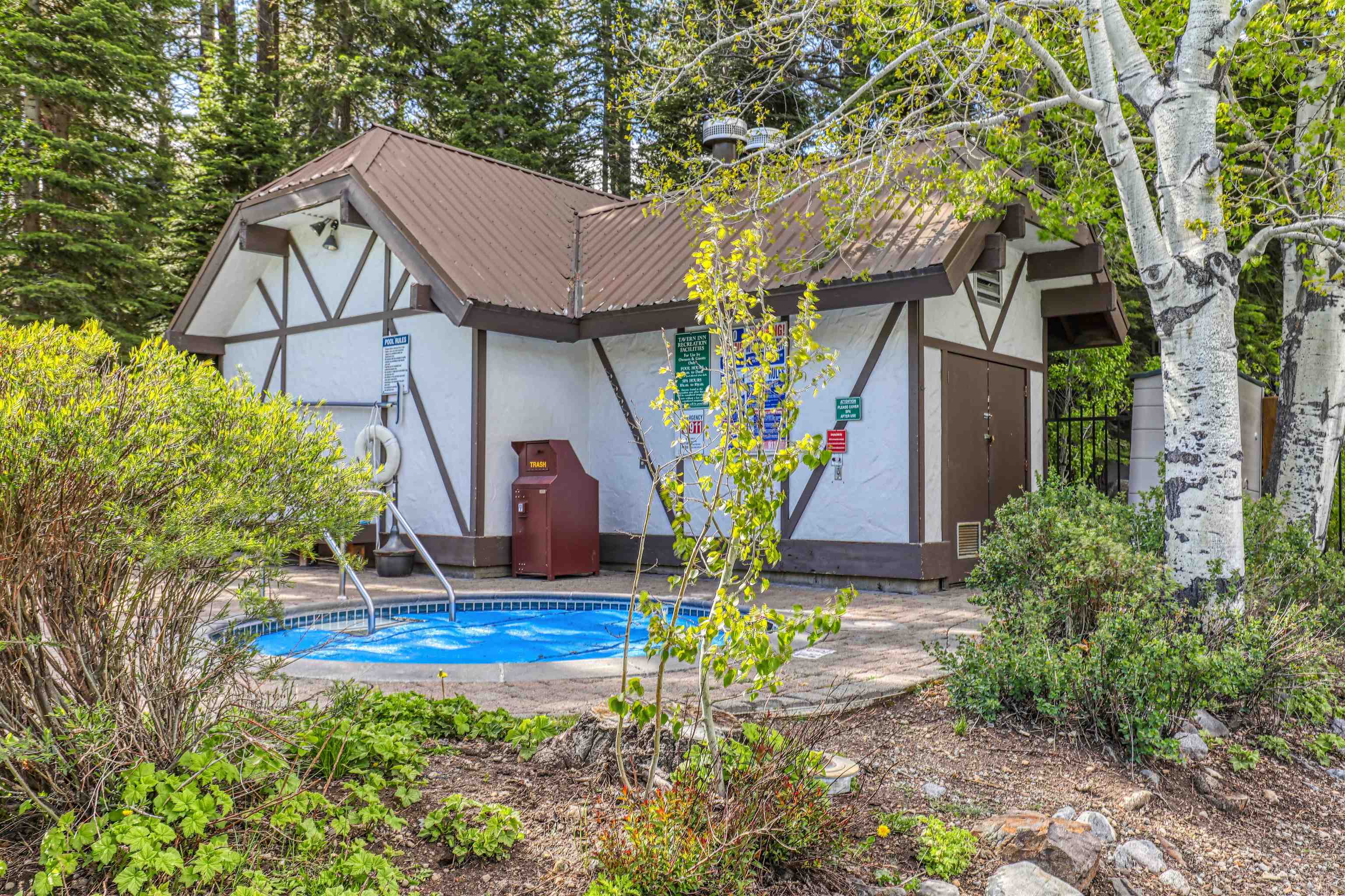 227 Olympic Vly Road, Unit 52 Olympic Valley, CA 96146 - Photo 11 of 21 a front view of a house with garden
