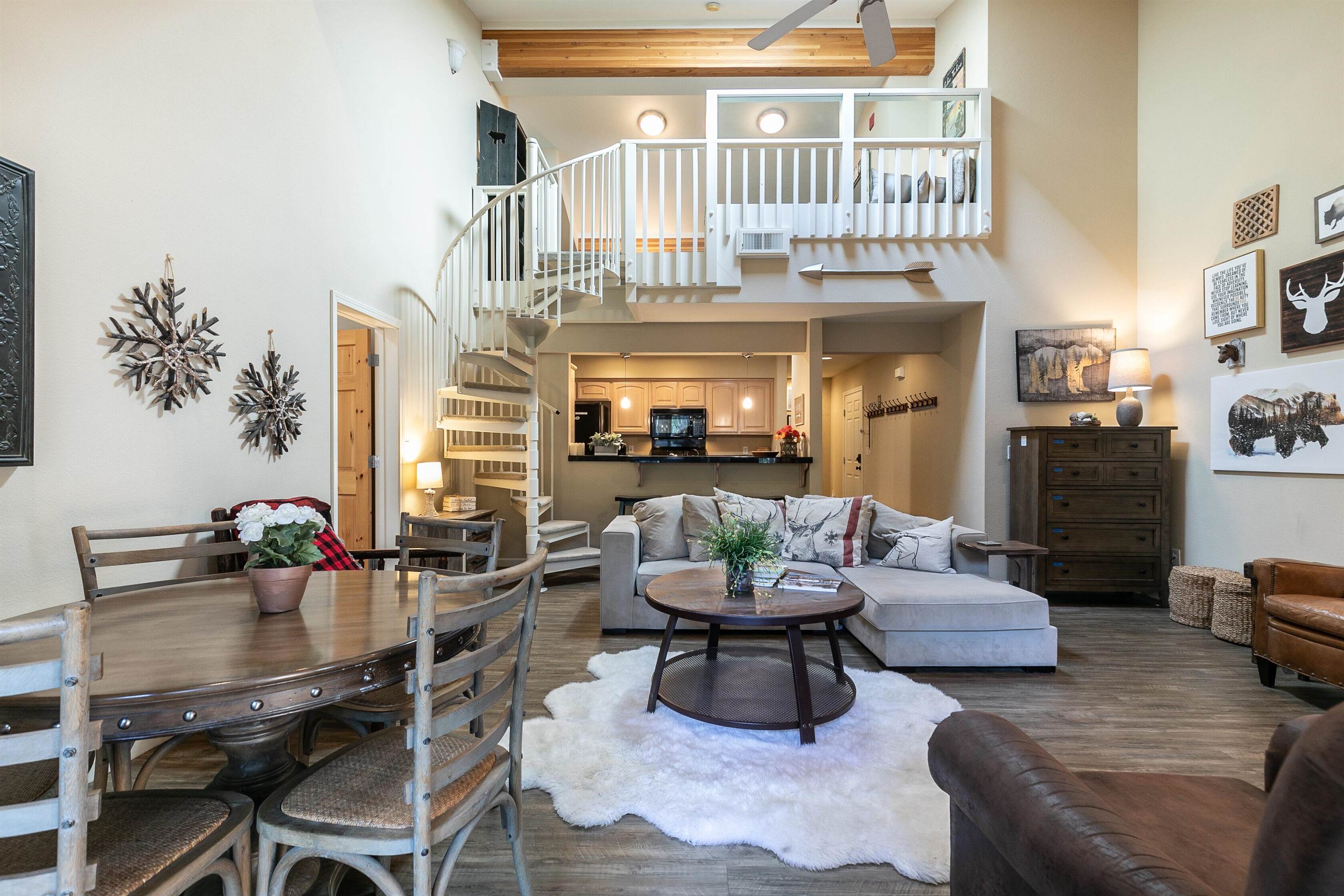 227 Olympic Vly Road, Unit 52 Olympic Valley, CA 96146 - Photo 5 of 21 a living room with furniture and a potted plant